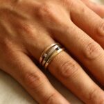 Gouden tricolor ring met diamant en saffier