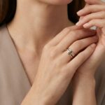 Gouden tricolor ring met diamant en saffier