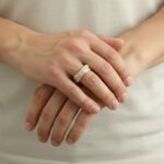 Gevlochten gouden ring met diamanten