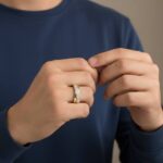 Gevlochten gouden ring met diamanten