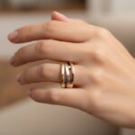 Gouden tricolor ring met diamant en saffier