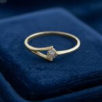 Geel gouden ring met centrale diamant