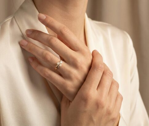 Geel gouden ring met parel en diamant