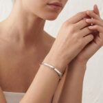 Wit gouden slavenarmband