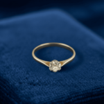 Gouden spiegelzetting met diamant