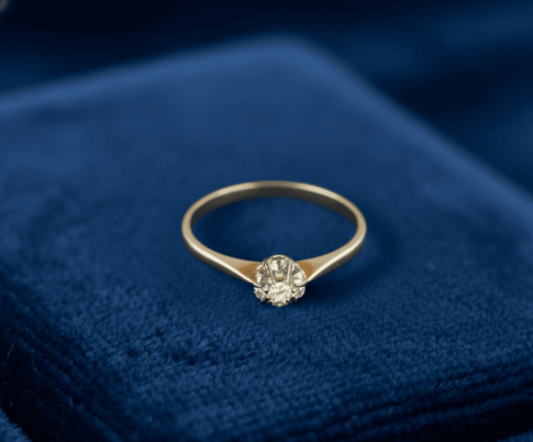 Gouden spiegelzetting met diamant