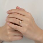 Bi color gouden ring met 1 diamant