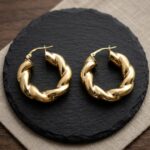 Gouden gevlochten oorbellen
