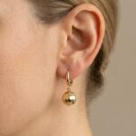 Gouden oorbellen met balletjes