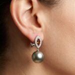 Gouden oorbellen met cultive parels en diamanten