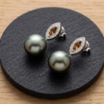 Gouden oorbellen met cultive parels en diamanten