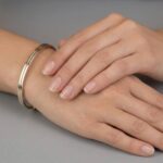 14 karaat gouden slavenarmband met veerslot