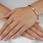 Christian slavenarmband geel goud