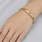 Christian slavenarmband geel goud