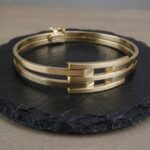 Geel gouden Christian schanier armband