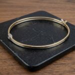 14 karaat gouden slavenarmband met veerslot