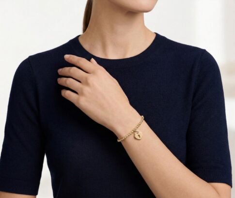 Geel gouden armband met harten hanger