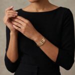 Geel gouden Christian schanier armband