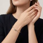 Gouden bicolor slavenarmband golvend model