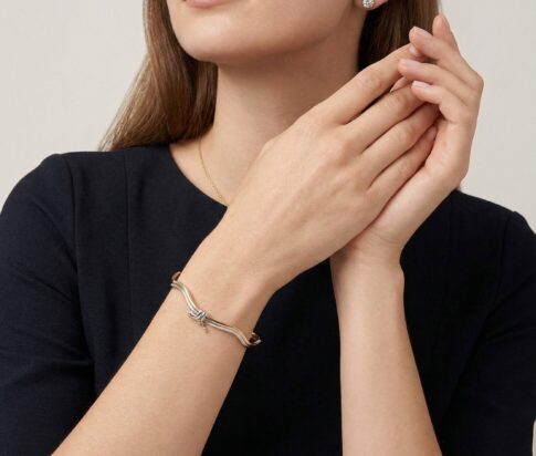 Gouden bicolor slavenarmband golvend model