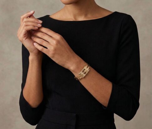 Geel gouden Christian schanier armband