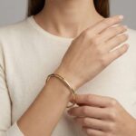 Christian slavenarmband geel goud