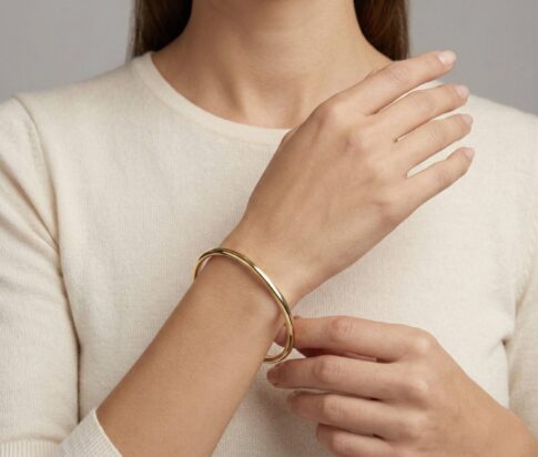 Christian slavenarmband geel goud