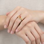 Gouden ring met ovale bloedkoraal