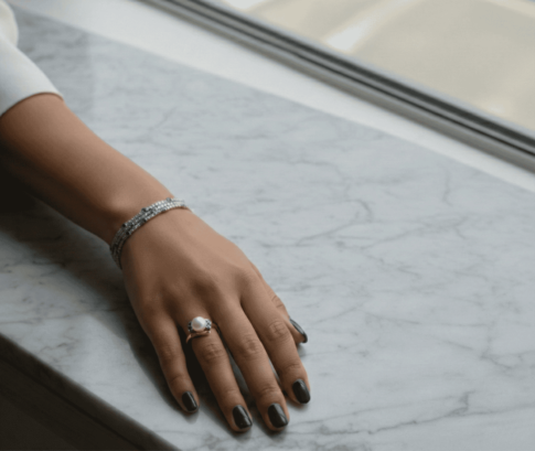 Gouden ring met parel en saffier