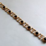 Geel gouden armband met granaten