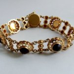 Geel gouden armband met granaten