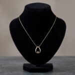 Gouden ketting met druppel hanger