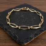 Gouden closed forever schakelarmband