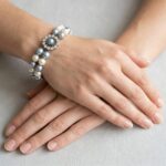 Parel armband met gouden slot met diamant