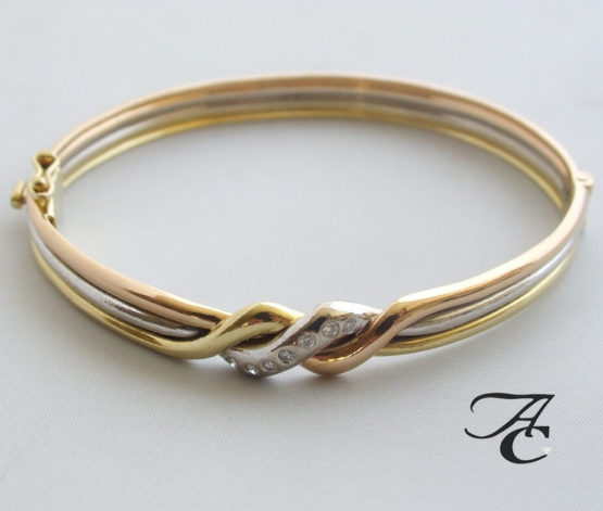 Gouden tricolor armband met diamant