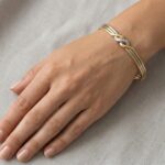 Gouden tricolor armband met diamant