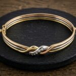 Gouden tricolor armband met diamant
