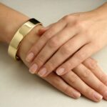 14 karaat geel gouden slavenarmband Christian