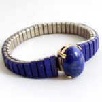 Stalen en gouden armband met lapis lazuli