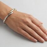 14 karaat bicolor slavenarmband halfrond model