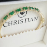 Gouden armband met smaragd en diamanten