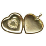 Gouden harten medaillon met onyx