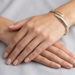 14 karaat bicolor slavenarmband halfrond model