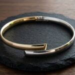 14 karaat bicolor slavenarmband halfrond model