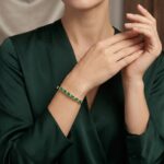 Gouden armband met smaragd en diamanten