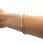 Gouden slavenarmband met diamanten