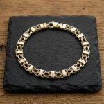 Goud schakelarmband