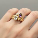 Gouden ring met topaas, amethist en briljant