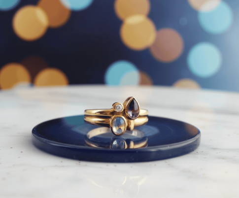 Gouden ring met topaas, amethist en briljant