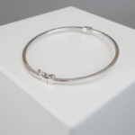 Christian wit gouden slavenarmband